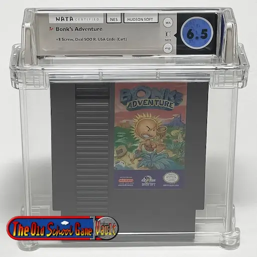 WATA graded 6.5 Bonk’s Adventure NES game cartridge by Hudson Soft in hard acrylic case, showing Bonk cartoon label