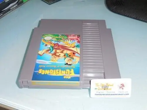 Flintstones: Surprise at Dinosaur Peak NES Cartridge front label, rare late-release Nintendo game often linked to Blockbuster rentals