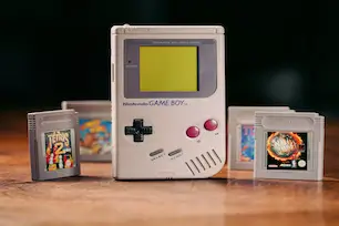 1990 Handheld Console of the Nintendo Game Boy and Games