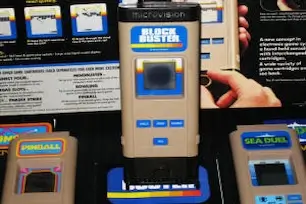 Close-up of Nintendo Game & Watch Ball handheld console showing gameplay screen with juggler character