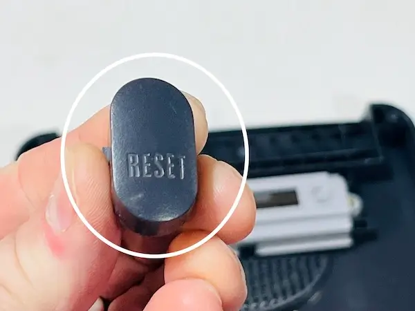 Step 4 - Place the Cleaned Reset Button back into the N64 Console