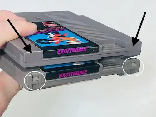 Comparison of NES cartridge shells showing no plastic tabs on a five-screw version versus tabs on a later three-screw version