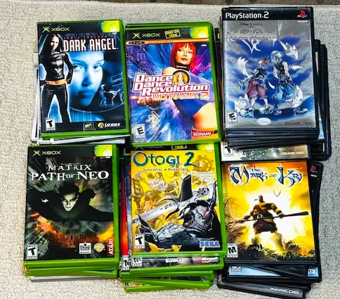 Large original Xbox and PS2 game collection sold to us from Ohio.